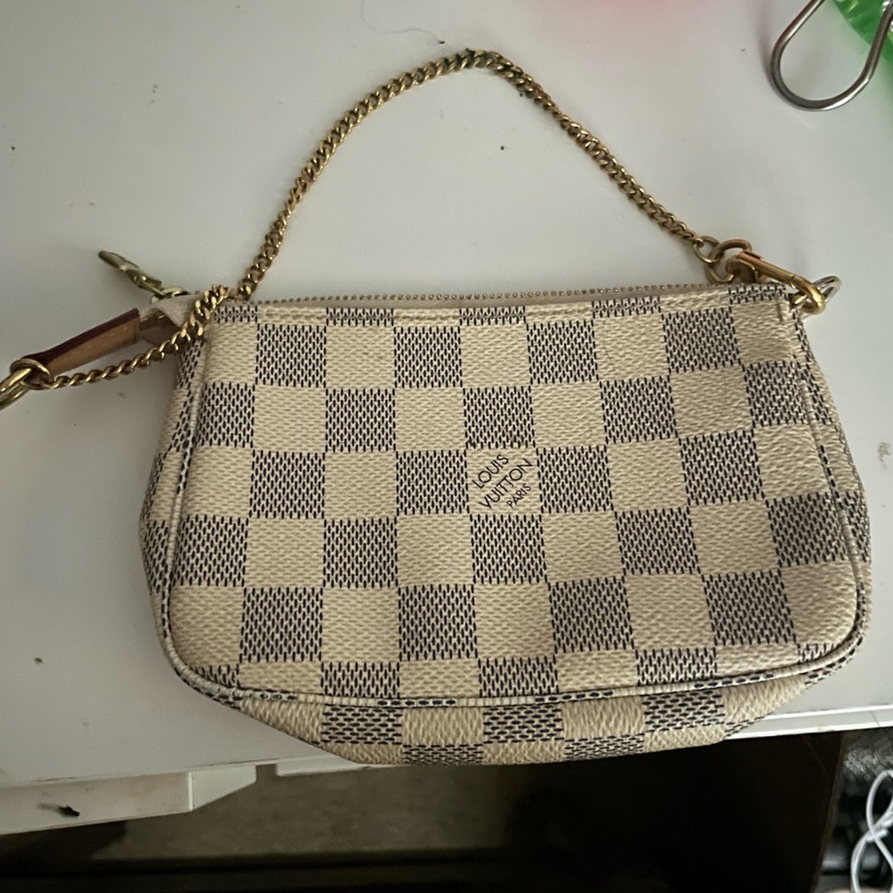 Authentic Louie Vuitton mini pochette